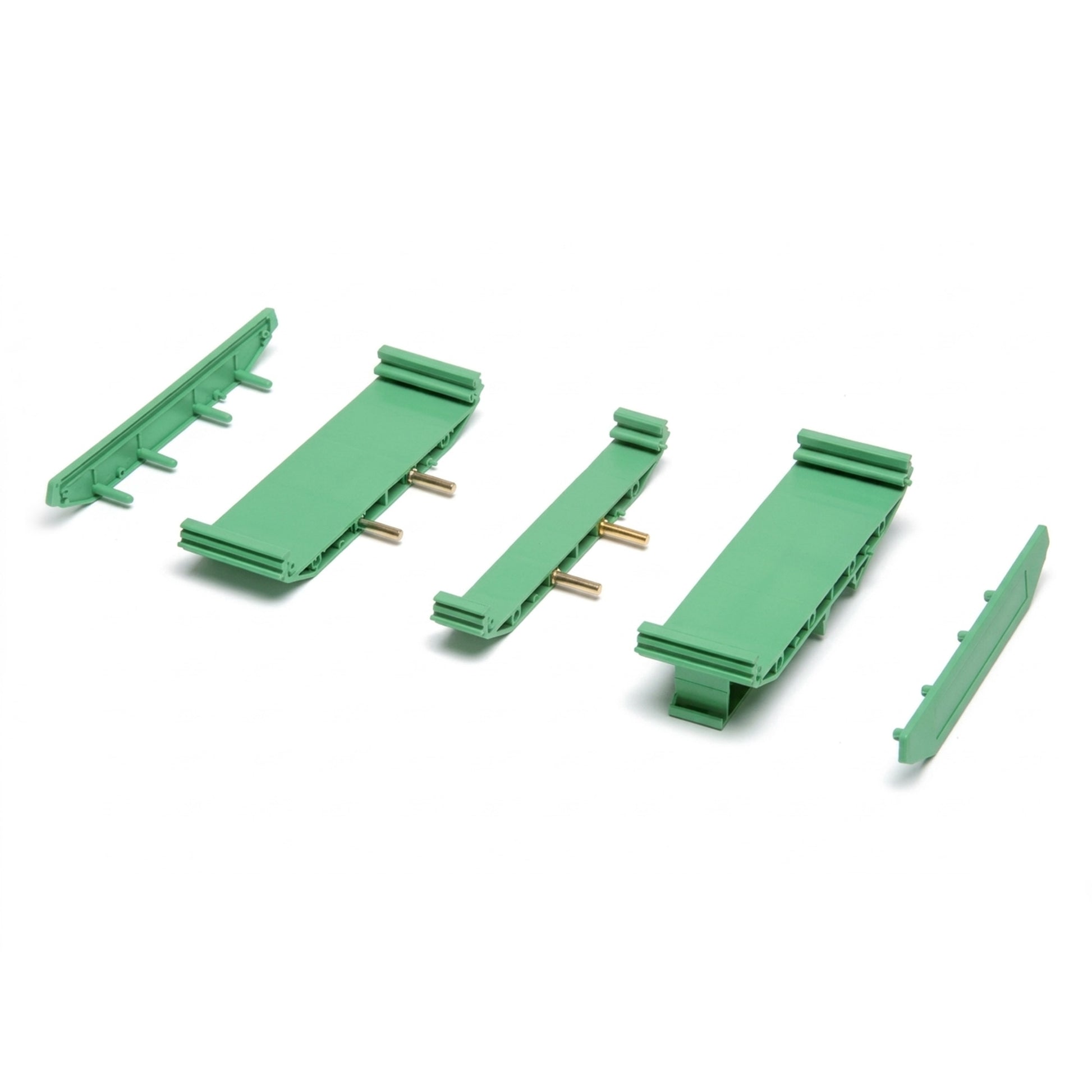 Set of green electronic connectors on a white background.