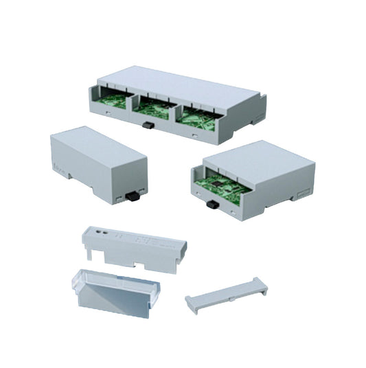 Set of electronic boxes with green circuit boards on a white background