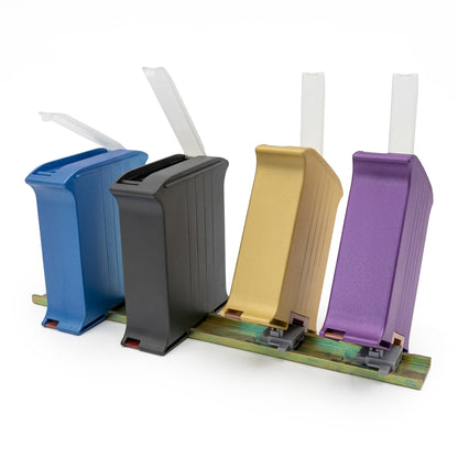 Set of four colorful PCB holders on a white background.