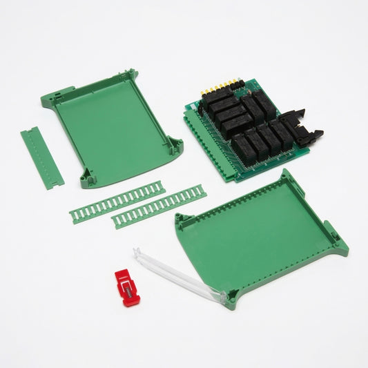 Electronic components including green plastic boards and a red connector on a white background.