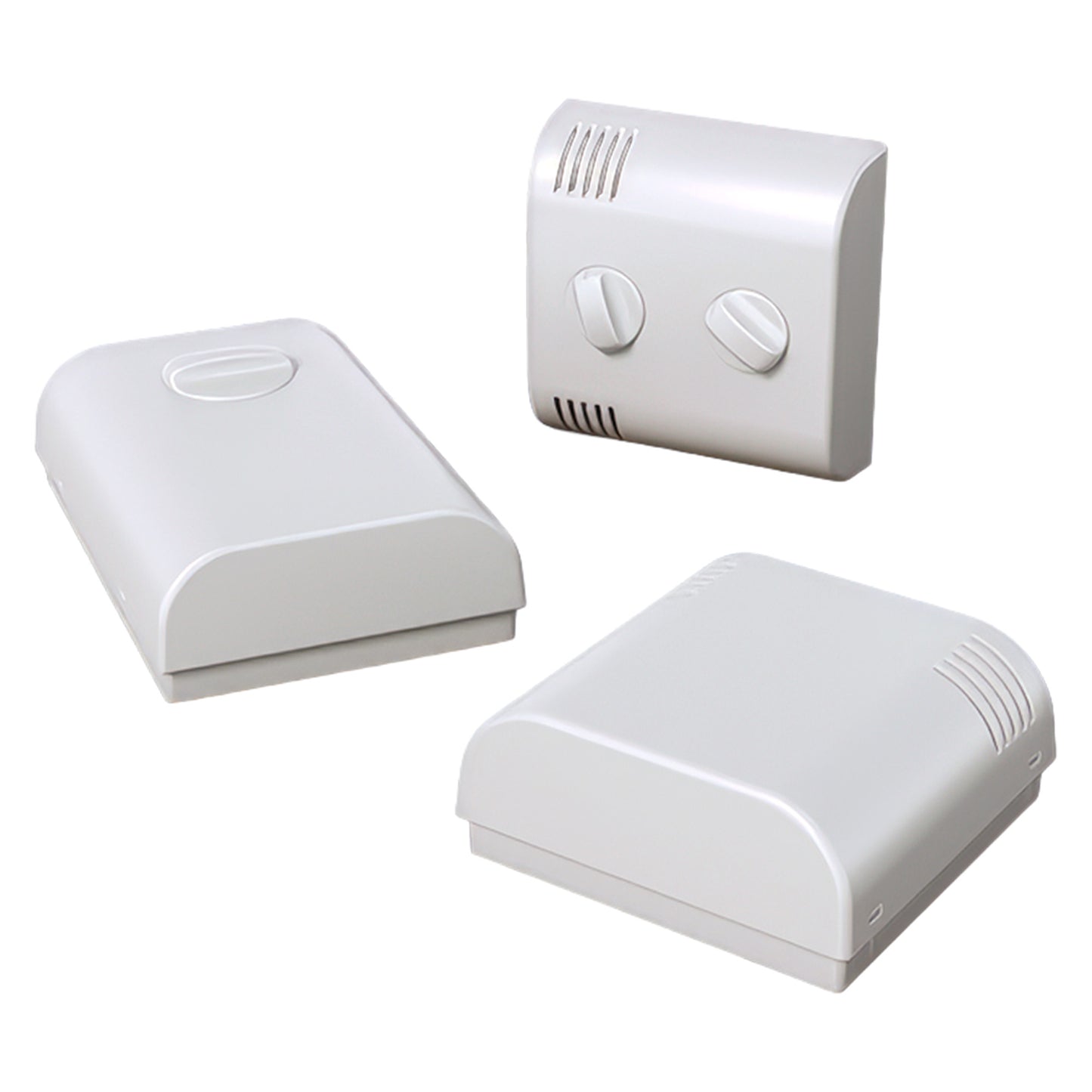 Three white electronic devices on a white background.